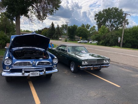 69 Plymouth Satellite (car on right)- Lou and Linda Grendahl